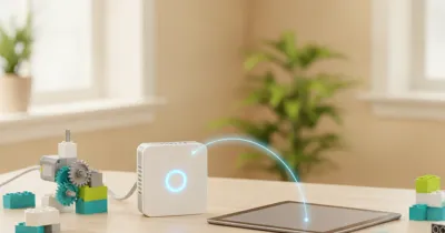 Смарт-хаб WeDo 2.0 с индикатором рядом с планшетом — подключение по Bluetooth