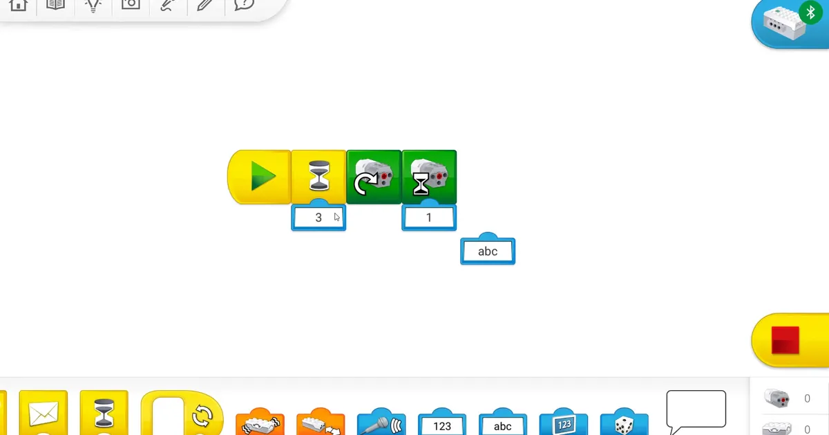 Палитра блоков программирования WeDo 2.0 и собранная цветная программа на экране приложения